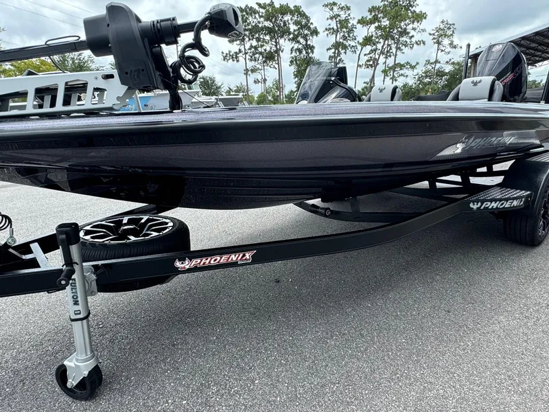 Slide: The Image of 2025 Phoenix 920 Elite 2 boat on a trailer, side view. - 3