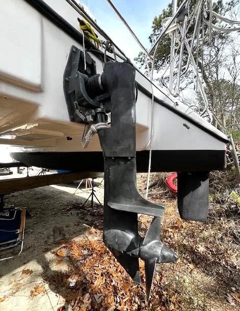 Slide: The Image of 2010 Gemini 105Mc sailboat with visible propeller and rudder on dry land. - 15