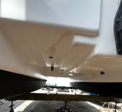 Slide: The Image of 2010 Gemini 105Mc catamaran hull underside on dry dock. - 16