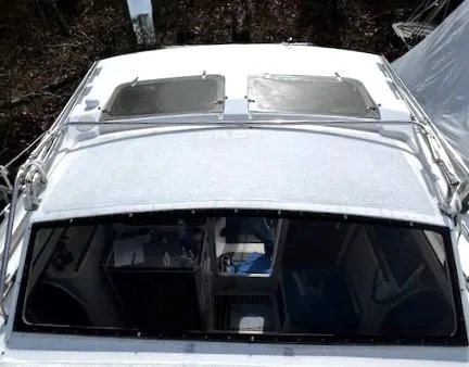 Slide: The Image of Overhead view of a 2010 Gemini 105Mc catamaran with visible hatches and cabin interior. - 31