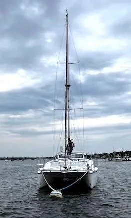 Slide: The Image of 2010 Gemini 105Mc catamaran on water under cloudy sky. - 5