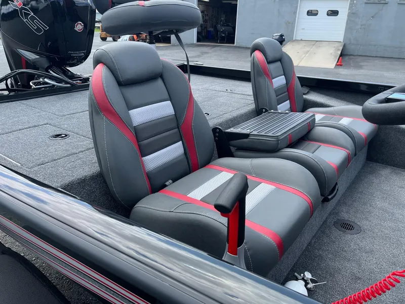 Slide: The Image of 2024 Ranger RT188 boat interior with gray and red seats, modern design. - 7