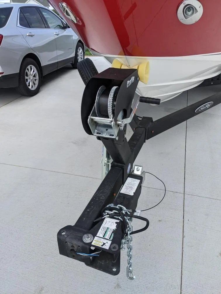 Slide: The Image of 2021 Sea Ray SLX 230 boat on trailer with winch. - 5