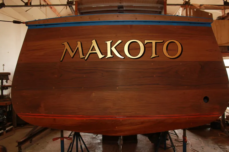 Slide: The Image of 1929 Stephens Brothers 34 Trunk Cabin Cruiser, wooden stern with "Makoto" nameplate. - 18