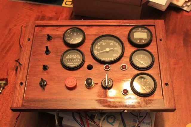 Slide: The Image of Instrument panel of a 1929 Stephens Brothers 34 Trunk Cabin Cruiser with gauges and switches. - 19