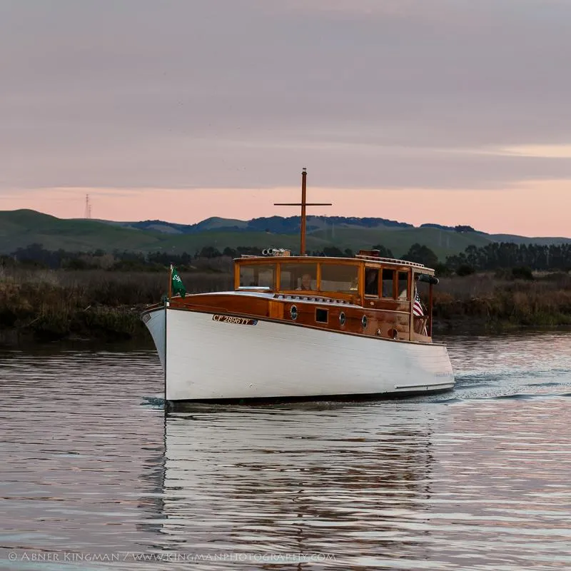 Slide: The Image of 1929 Stephens Brothers 34 Trunk Cabin Cruiser on calm water at sunset. - 3