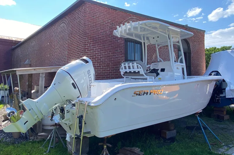Slide: The Image of 2024 Sea Pro 222 Center Console boat with Suzuki outboard motor. - 1