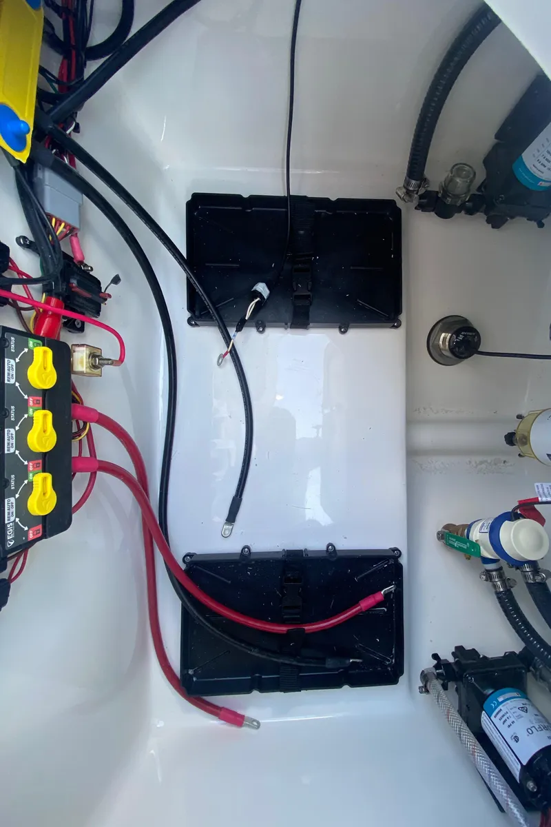 Slide: The Image of 2024 Sea Pro 222 Center Console boat wiring and battery compartment. - 13