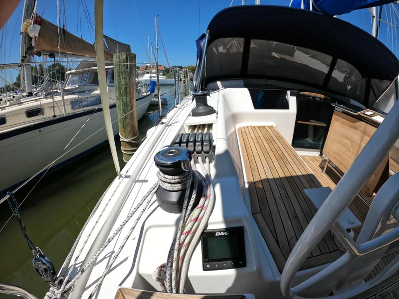 Slide: The Image of 2019 Hanse 388 sailboat cockpit with winch and navigation equipment. - 12