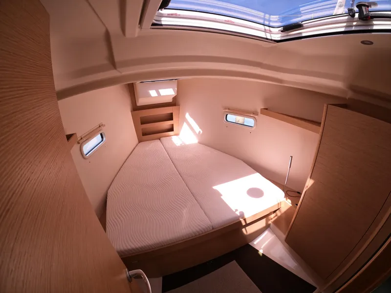 Slide: The Image of Cozy cabin interior of 2019 Hanse 388 yacht with skylight and modern design. - 18