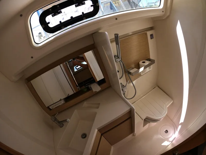 Slide: The Image of 2019 Hanse 388 yacht bathroom with modern fixtures and compact design. - 22