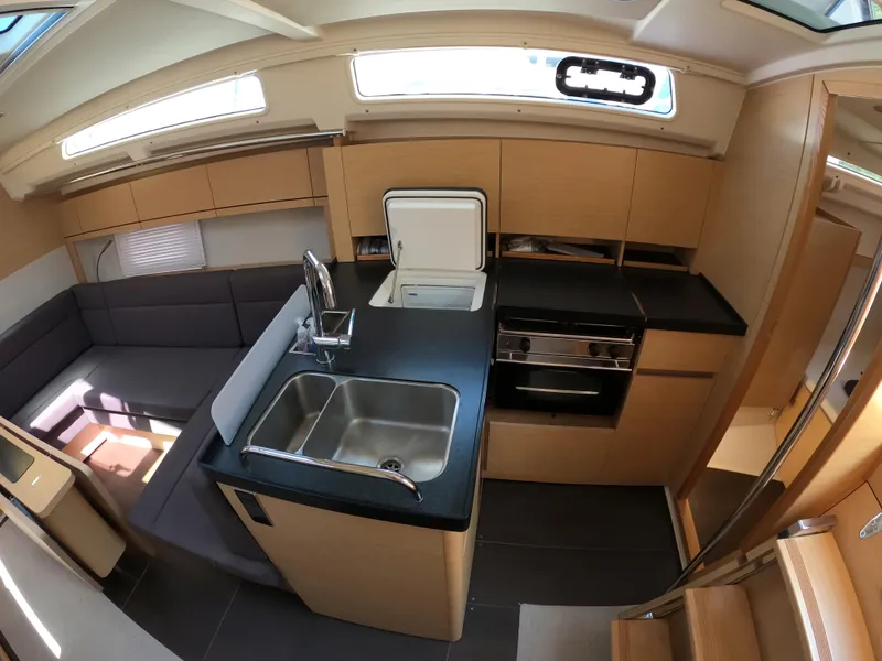 Slide: The Image of Modern kitchen interior of 2019 Hanse 388 yacht with sleek design and ample storage. - 25