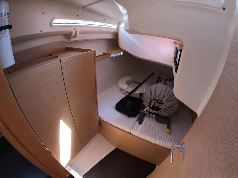 Slide: The Image of Interior cabin of 2019 Hanse 388 yacht with storage and bedding. - 31