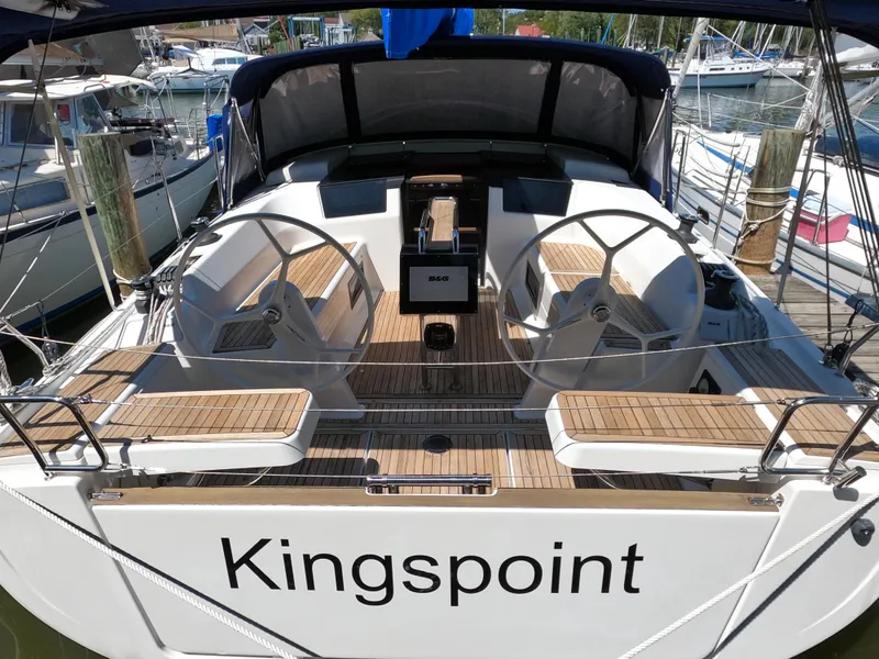 Slide: The Image of 2019 Hanse 388 sailboat "Kingspoint" with dual steering wheels and teak deck. - 6