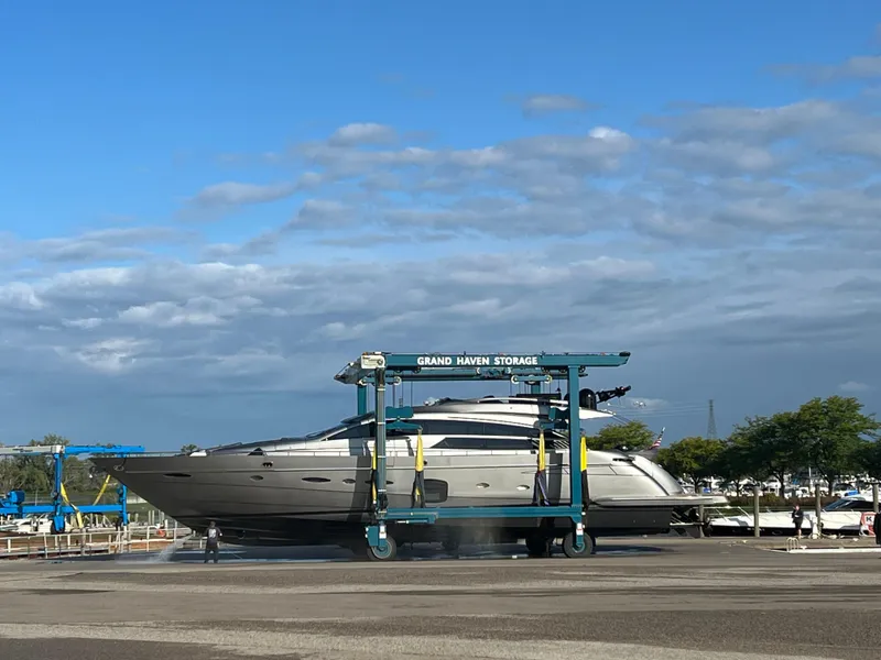 Slide: The Image of 2017 Pershing 92 Motor Yacht on lift at Grand Haven Storage. - 1