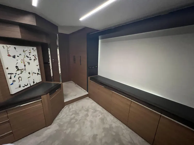 Slide: The Image of Luxurious interior of 2017 Pershing 92 Motor Yacht with modern design and elegant wood finishes. - 40