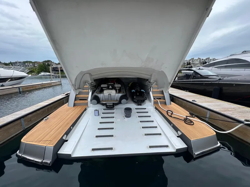 Slide: The Image of 2017 Pershing 92 Motor Yacht with open garage at marina. - 9