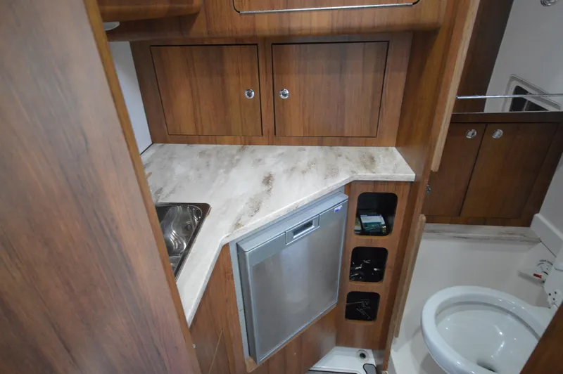 Slide: The Image of 2018 Invincible 43 Open Fisherman cabin with kitchenette and toilet. - 30