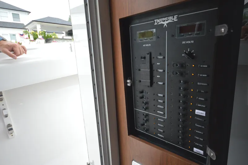 Slide: The Image of Electrical control panel of a 2018 Invincible 43 Open Fisherman boat. - 32