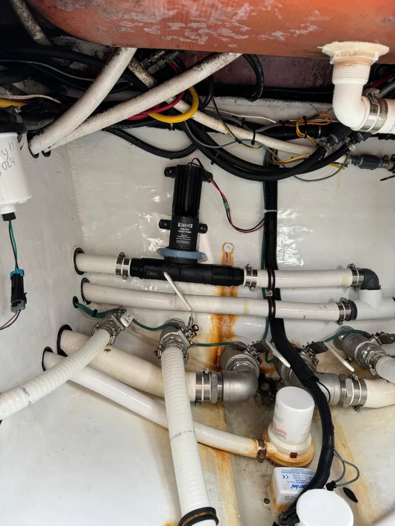 Slide: The Image of 2018 Invincible 43 Open Fisherman boat plumbing and wiring system. - 37