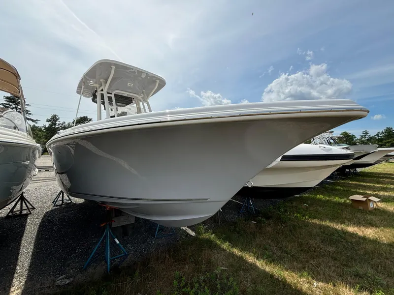 Slide: The Image of 2025 Key West 239 FS boat on display in a lot. - 0