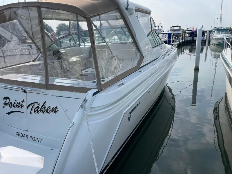 Slide: The Image of 1997 Formula 40 boat named Point Taken docked at Cedar Point marina. - 2
