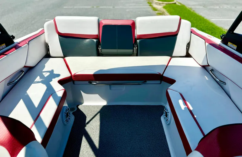 Slide: The Image of Interior of 2015 Scarab 215 HO Impulse boat with red and white seating. - 35
