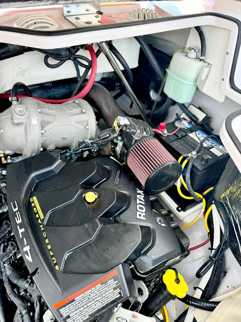 Slide: The Image of Engine compartment of 2015 Scarab 215 HO Impulse with visible components and wiring. - 38