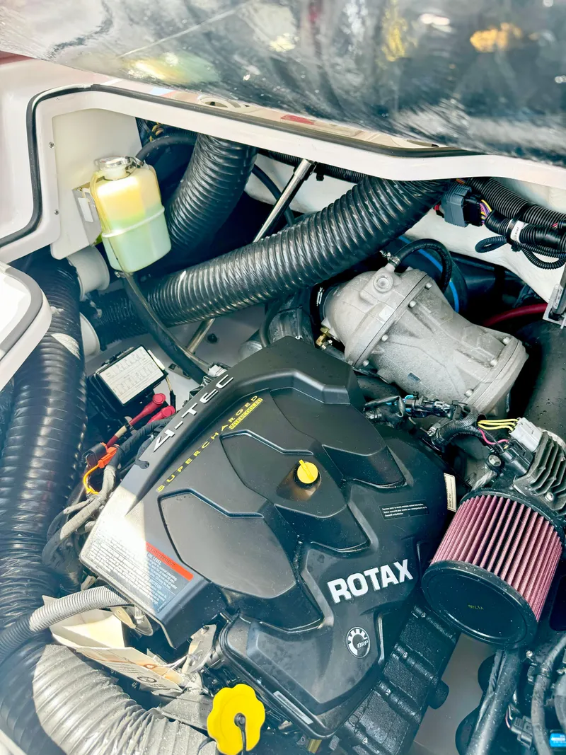 Slide: The Image of 2015 Scarab 215 HO Impulse engine compartment with Rotax engine components. - 7