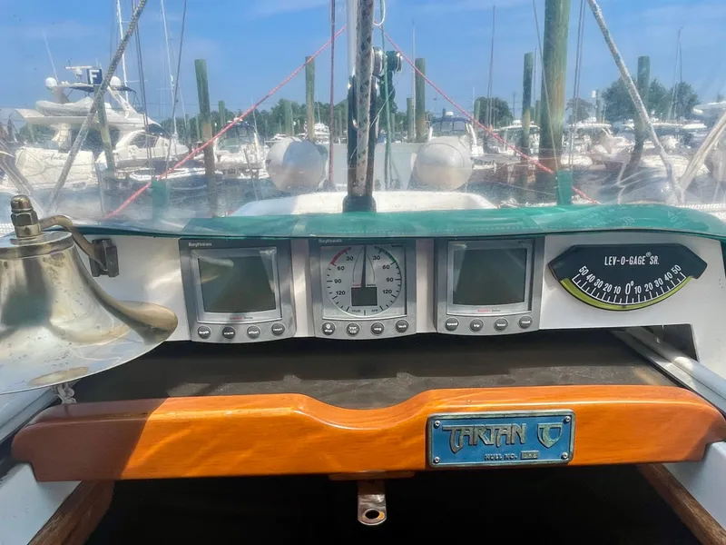 Slide: The Image of Tartan 4100 sailboat cockpit with navigation instruments, 2001 model. - 15
