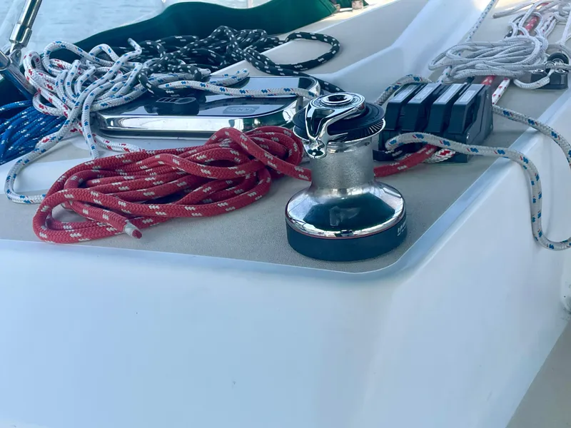 Slide: The Image of Sailing equipment on Tartan 4100 yacht, featuring winch and ropes, 2001 model. - 17