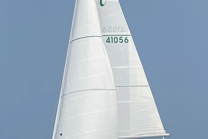 Slide: The Image of Sailing yacht Tartan 4100, 2001 model, cruising on open water. - 42