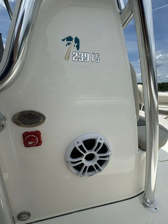 Slide: The Image of 2025 Key West 239FS boat interior with speaker and logo - 18