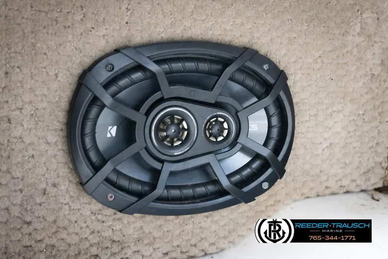 Slide: The Image of Close-up of a speaker in a 2002 Larson LXI 210 boat. - 30