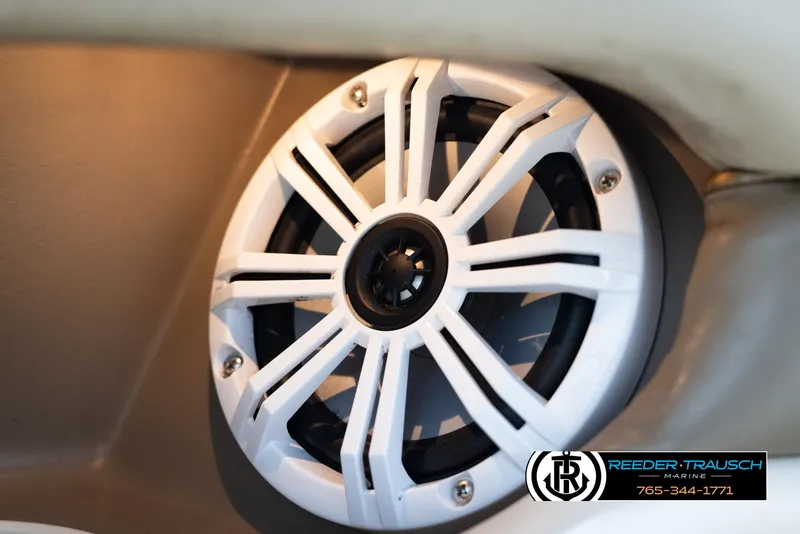 Slide: The Image of Close-up of a 2002 Larson LXI 210 boat speaker system. - 31