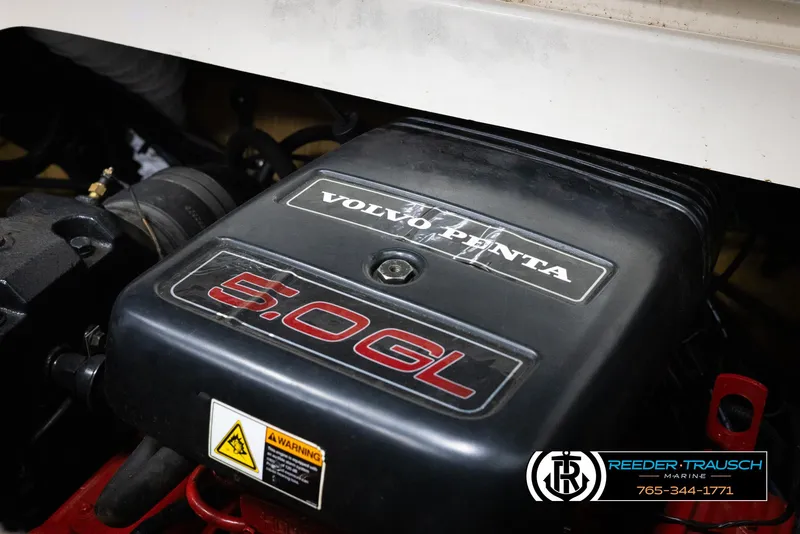 Slide: The Image of 2002 Larson LXI 210 boat with Volvo Penta 5.0GL engine. - 36