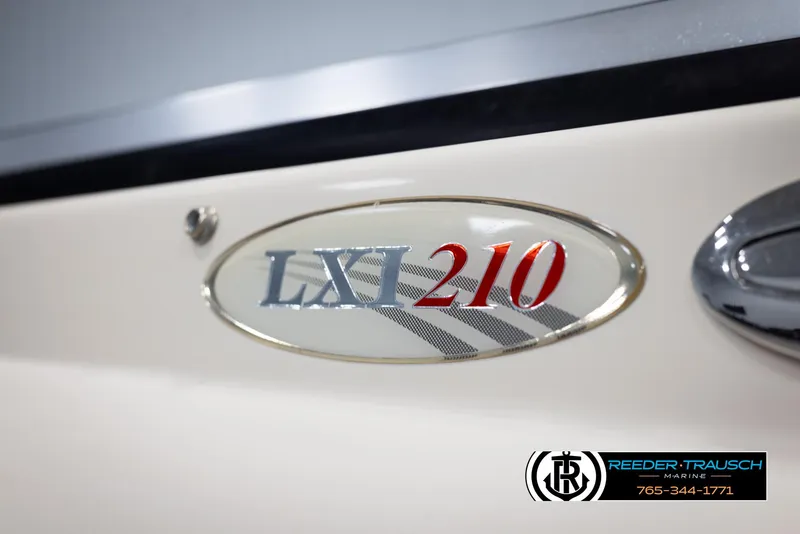 Slide: The Image of 2002 Larson LXI 210 boat model emblem - 41