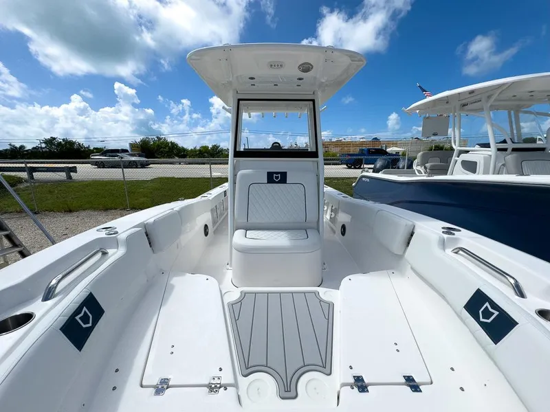 Slide: The Image of 2025 Sea Fox 248 Commander boat interior with seating and storage compartments. - 19