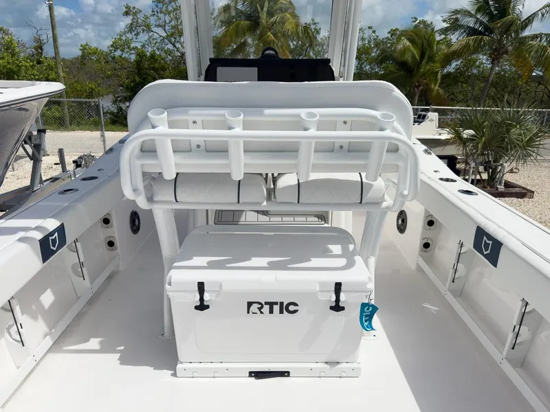 Slide: The Image of 2025 Sea Fox 248 Commander boat interior with RTIC cooler and seating. - 6