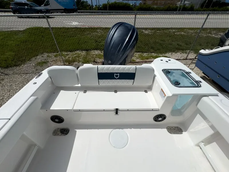 Slide: The Image of 2025 Sea Fox 248 Commander boat stern with seating and outboard motor. - 8