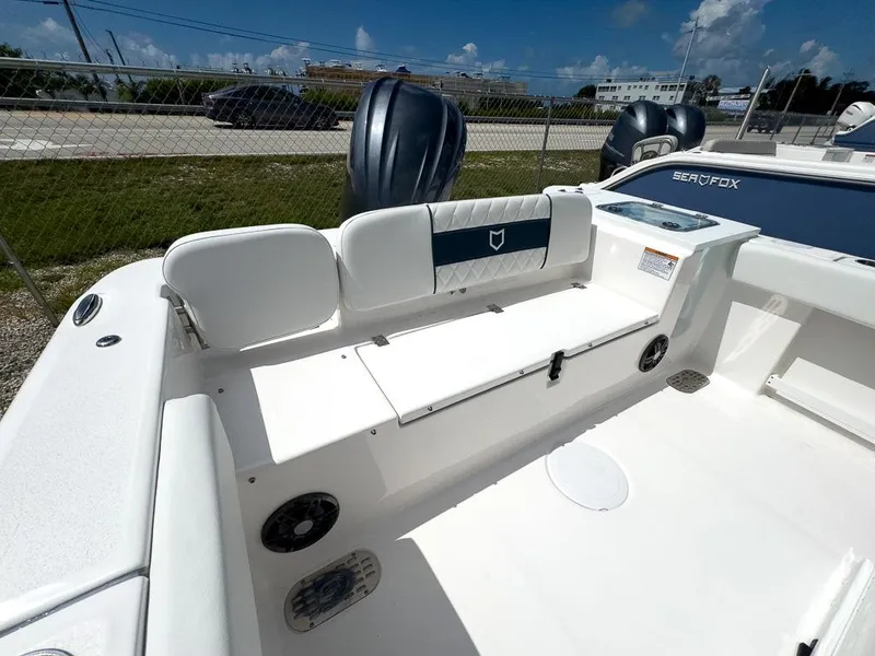 Slide: The Image of 2025 Sea Fox 248 Commander boat interior with seating and storage. - 9