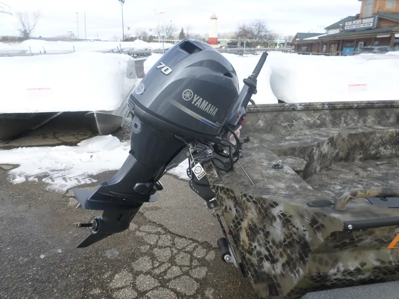 Slide: The Image of Yamaha 70 outboard motor on Excel 1864 SWSB boat, snowy background, 2025 model. - 4