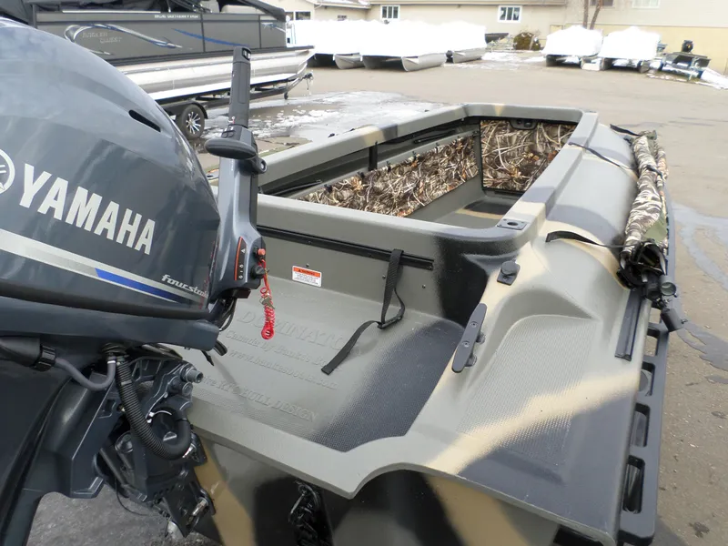 Slide: The Image of 2024 Bankes 14' Dominator boat with Yamaha four-stroke outboard motor. - 5