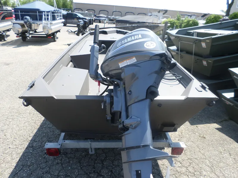 Slide: The Image of 2024 Alweld 1648 VV Marsh boat with Yamaha outboard motor in a dealership lot. - 4