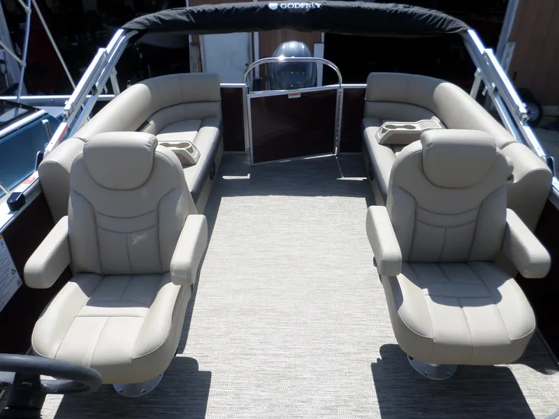 Slide: The Image of 2024 Godfrey Sweetwater 2286SB Tri pontoon boat with beige leather seating. - 3