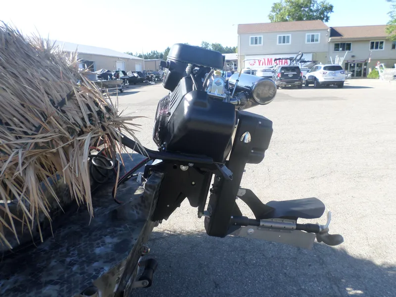 Slide: The Image of 2024 Excel 1860 SWV4 OFP boat motor in a dealership lot. - 4