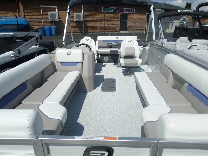 Slide: The Image of 2024 Princecraft VECTRA 23 RL III pontoon boat interior with spacious seating. - 2