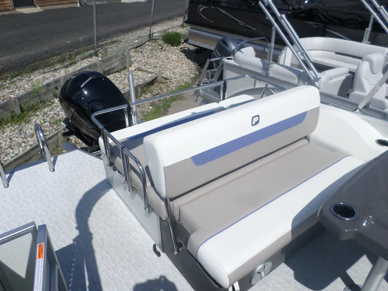 Slide: The Image of 2024 Princecraft VECTRA 23 RL III boat interior with seating and outboard motor. - 6