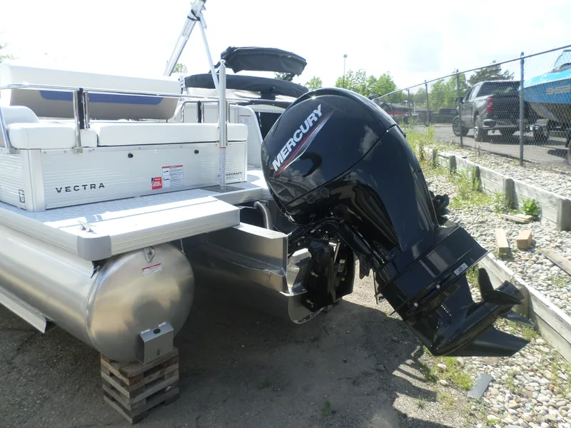 Slide: The Image of 2024 Princecraft VECTRA 23 RL III pontoon boat with Mercury outboard motor. - 7