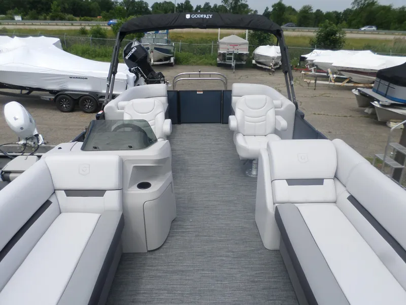Slide: The Image of 2025 Godfrey Sweetwater 2286 SB Tri pontoon boat with spacious seating and modern design. - 3